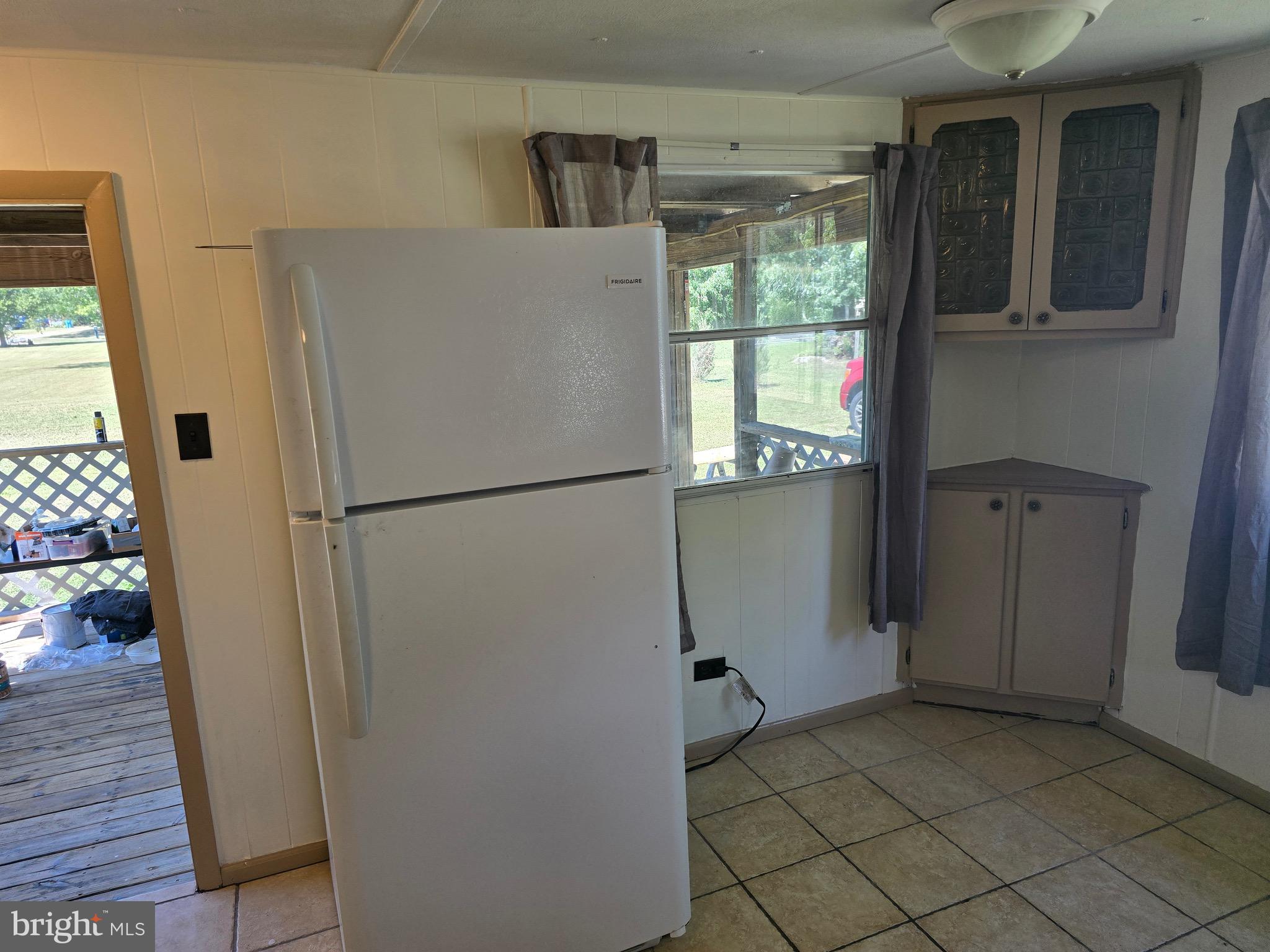 4662 Powellville Road Pittsville, MD 21850 - Photo 23 of 34 a refrigerator freezer sitting inside of a kitchen