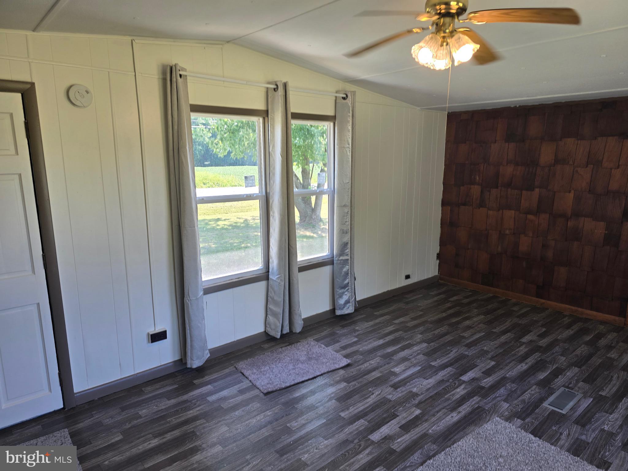 4662 Powellville Road Pittsville, MD 21850 - Photo 3 of 34 a view of an empty room with a window