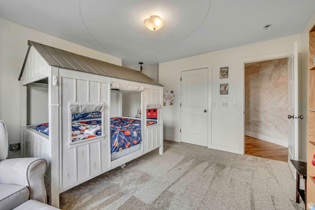 3054 West Ridgeline Road Stockton, UT 84071 - Photo 23 of 88 Bedroom featuring light colored carpet