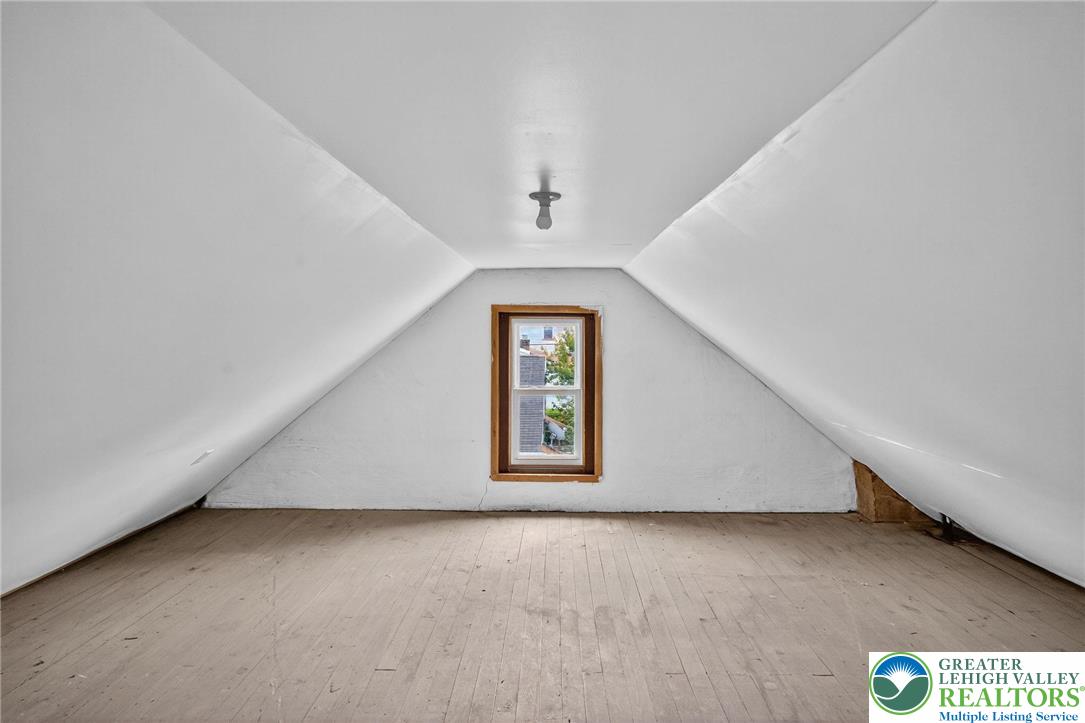 1106 Broadway Bethlehem, PA 18015 - Photo 22 of 25 an empty room with windows and cabinet