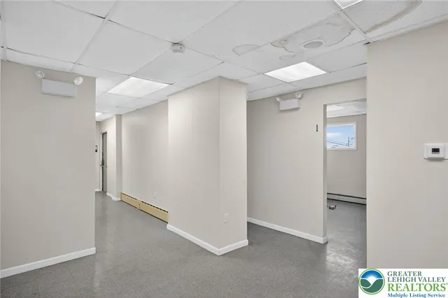 a view of a room with furniture and closet