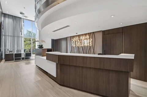 a bathroom with a shower and a sink