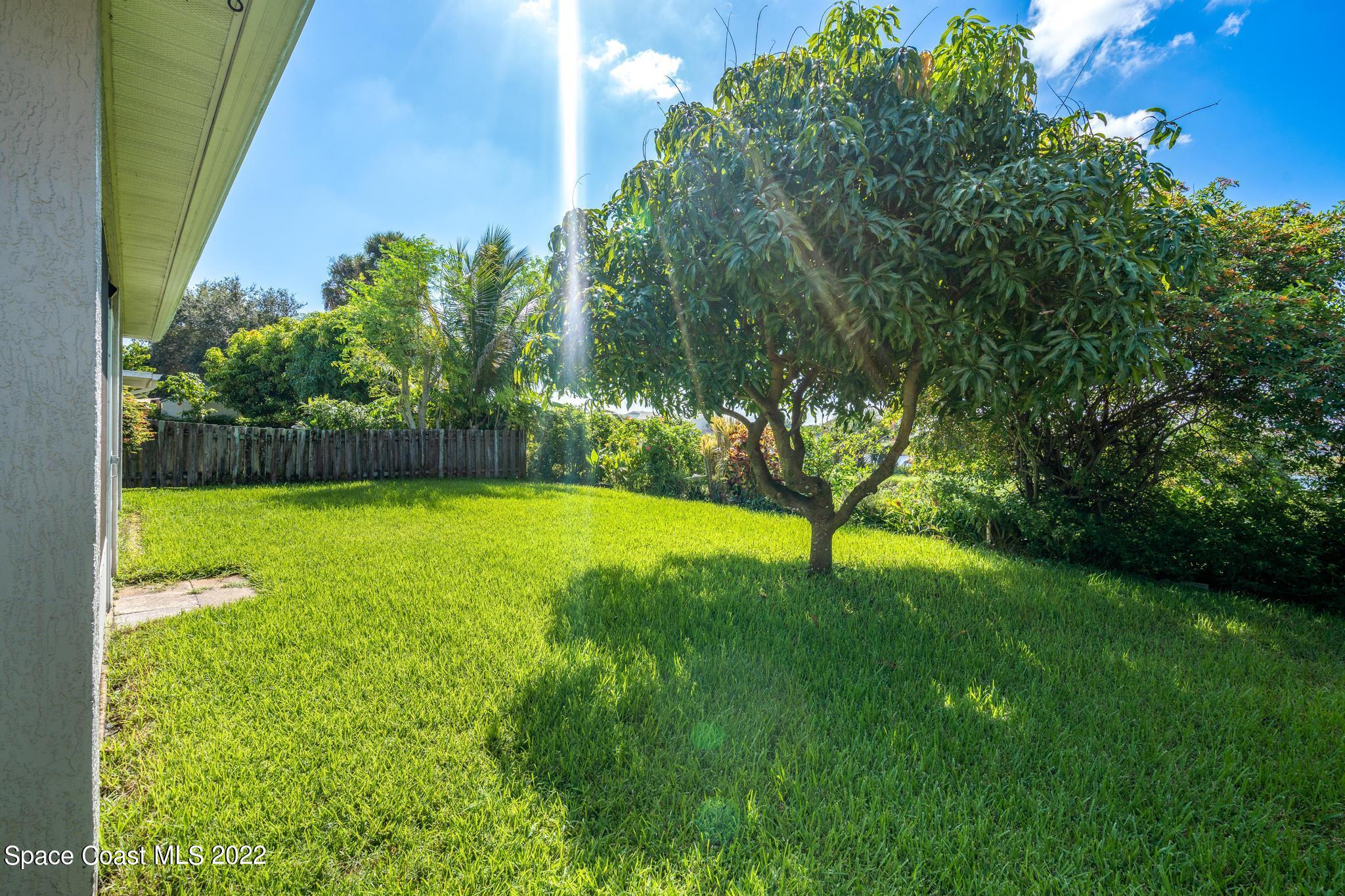 1920 Brookshire Circle Melbourne, FL 32904 - Photo 31 of 41 a view of swimming pool with a yard