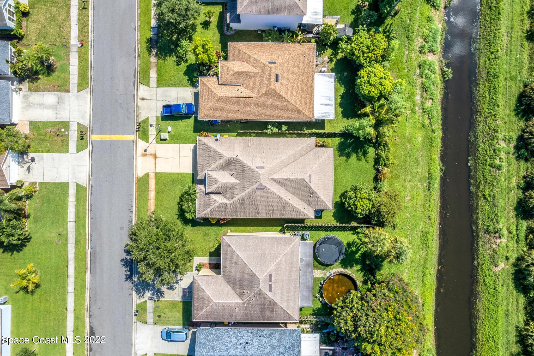 1920 Brookshire Circle Melbourne, FL 32904 - Photo 41 of 41 an aerial view of residential houses with outdoor space and street view
