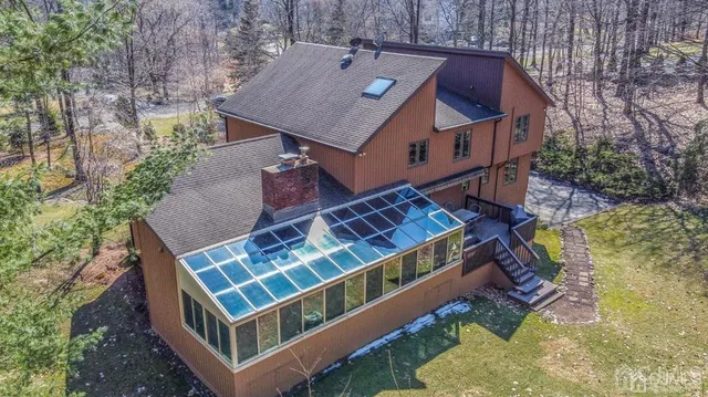 a backyard of a house with lots of green space