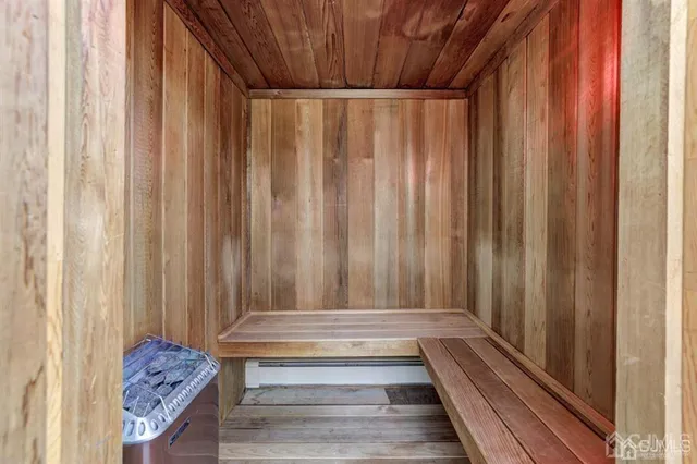 a bathroom with a sink and curtain