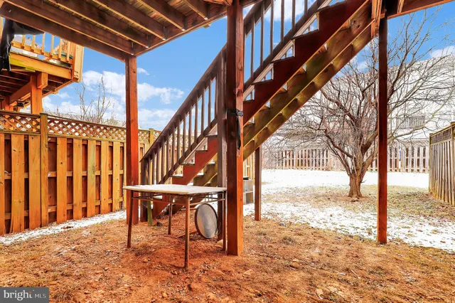 a view of a street with a building in the background