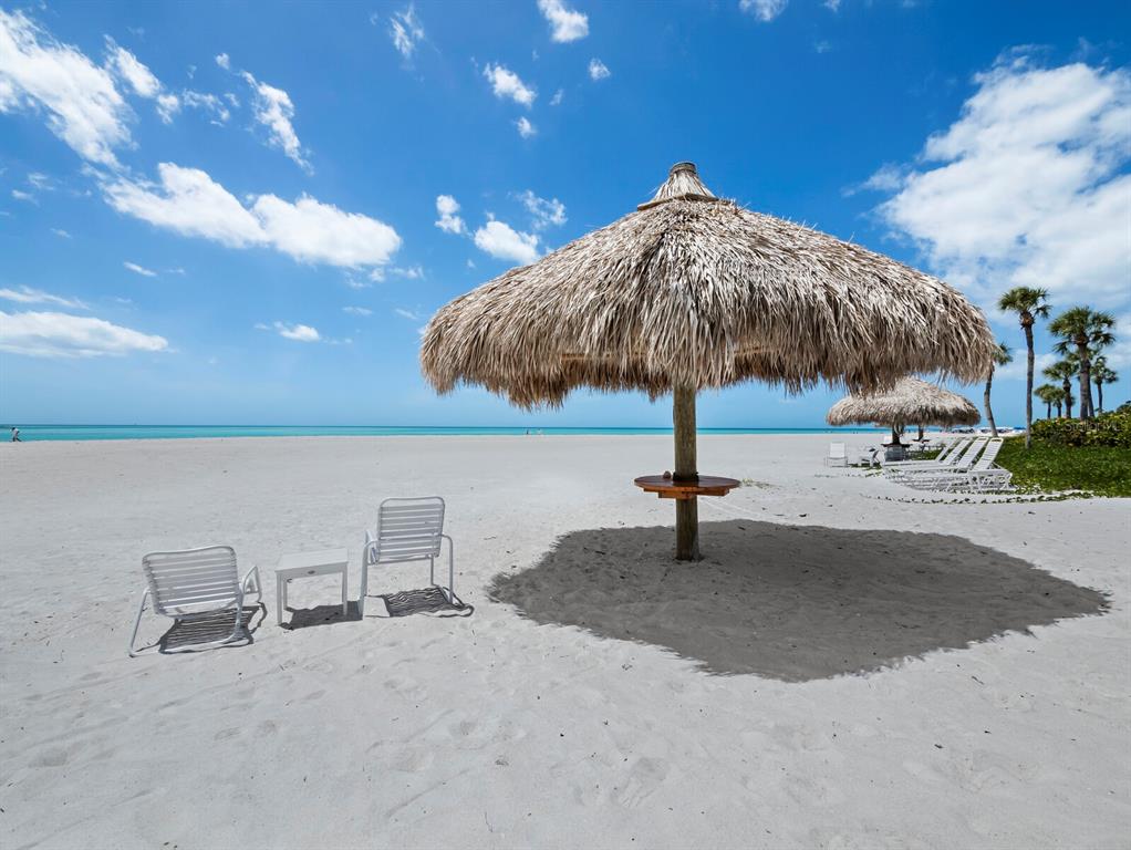 100 Sands Point Road, Unit 108 Longboat Key, FL 34228 - Photo 41 of 46 a view of a terrace with yard