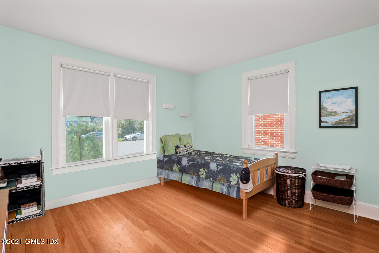 45 Rodwell Avenue Greenwich, CT 06830 - Photo 12 of 42 a bedroom with a bed and a window