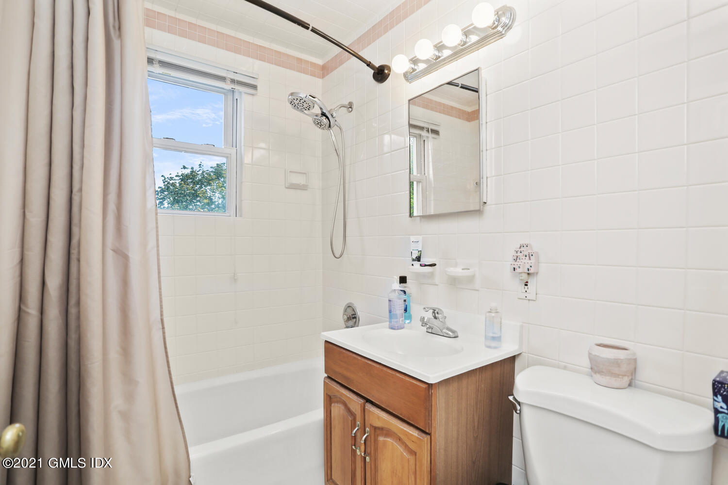 45 Rodwell Avenue Greenwich, CT 06830 - Photo 31 of 42 a bathroom with a sink a toilet and shower
