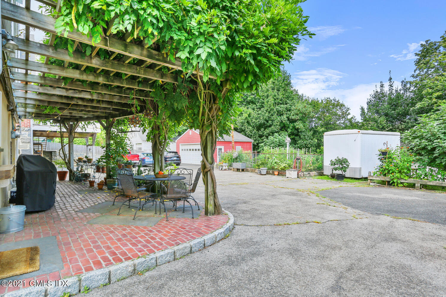 45 Rodwell Avenue Greenwich, CT 06830 - Photo 35 of 42 a view of a chairs and tables in patio