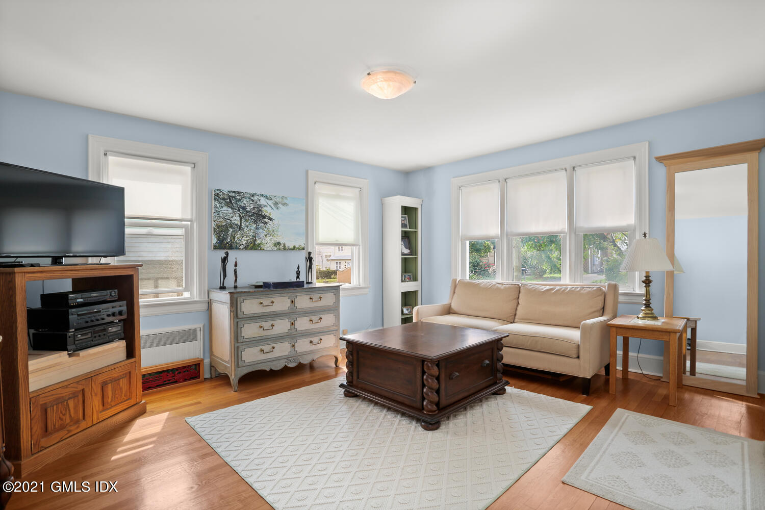 45 Rodwell Avenue Greenwich, CT 06830 - Photo 6 of 42 a living room with furniture and a flat screen tv