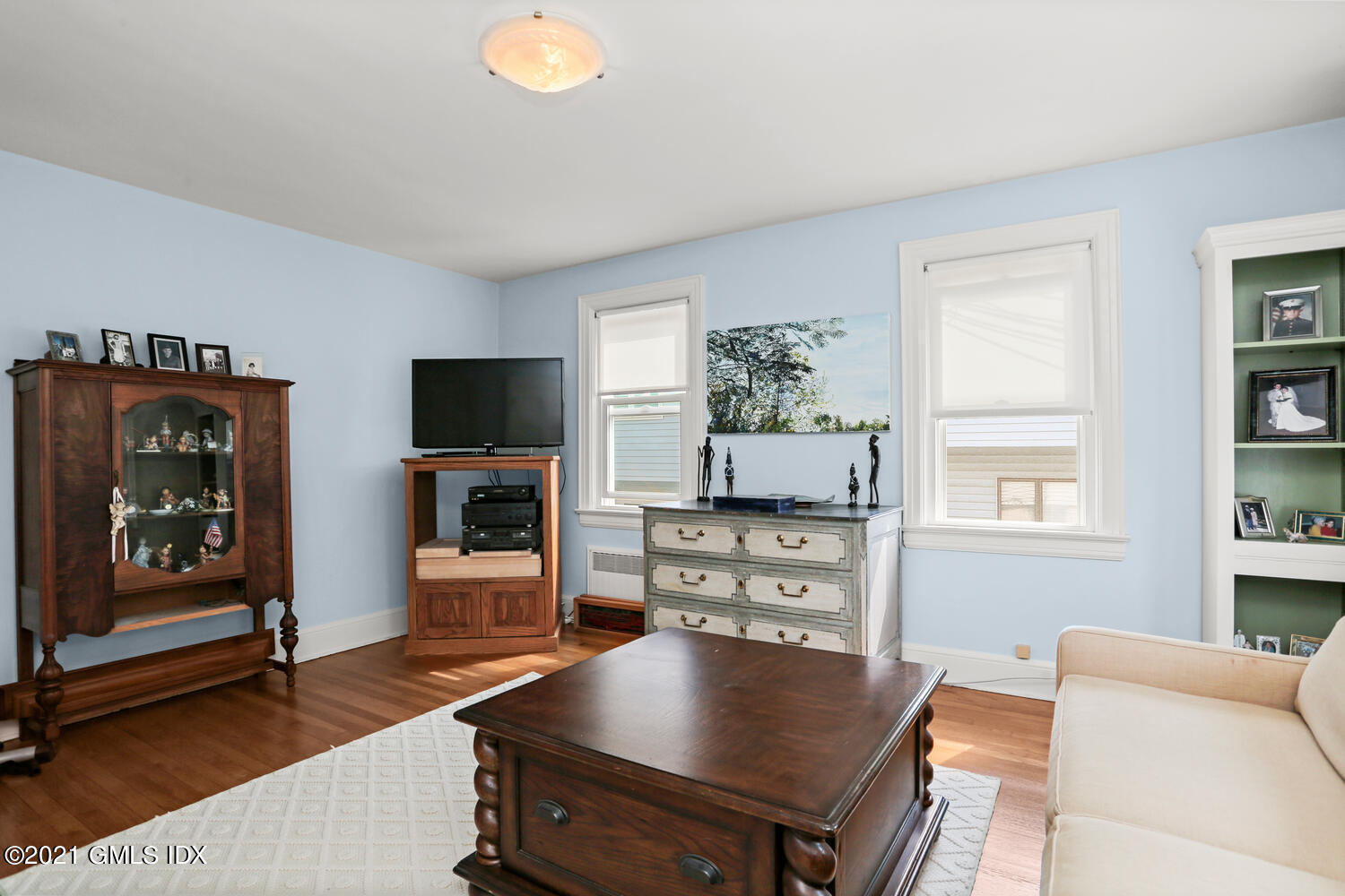 45 Rodwell Avenue Greenwich, CT 06830 - Photo 7 of 42 a living room with furniture and a flat screen tv