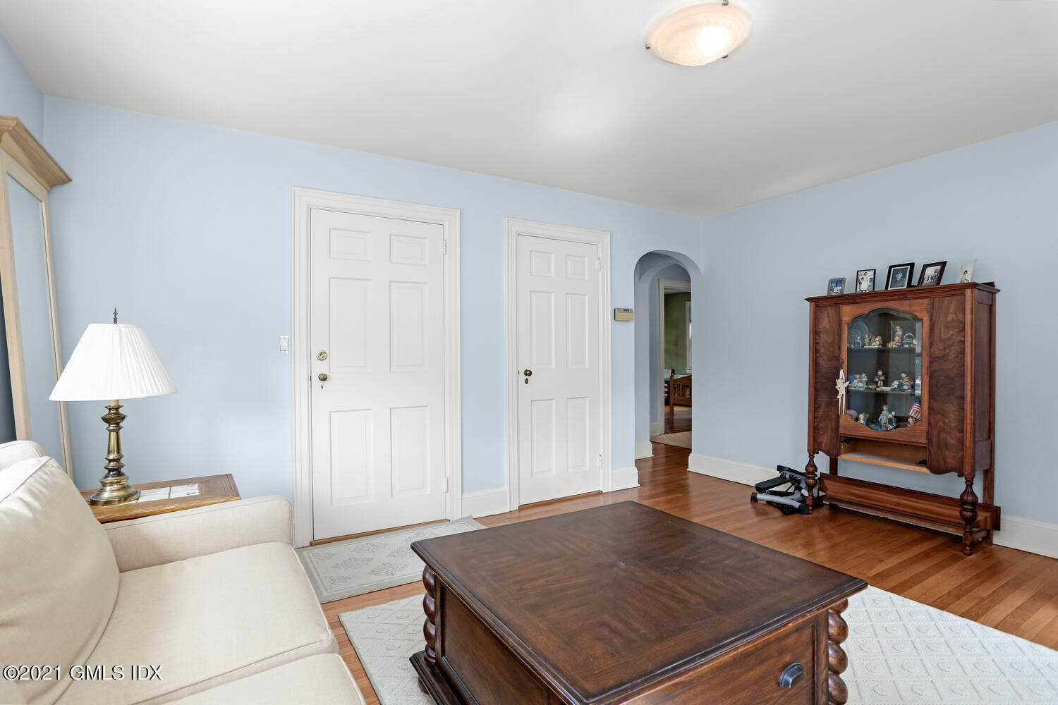 45 Rodwell Avenue Greenwich, CT 06830 - Photo 8 of 42 a living room with a table and gym equipment
