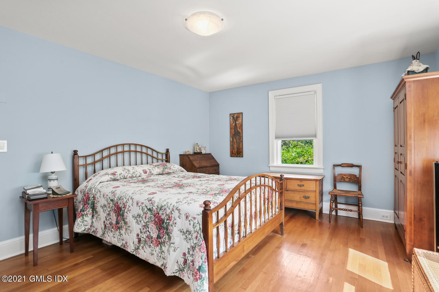 45 Rodwell Avenue Greenwich, CT 06830 - Photo 10 of 42 a bedroom with a bed and a table in it