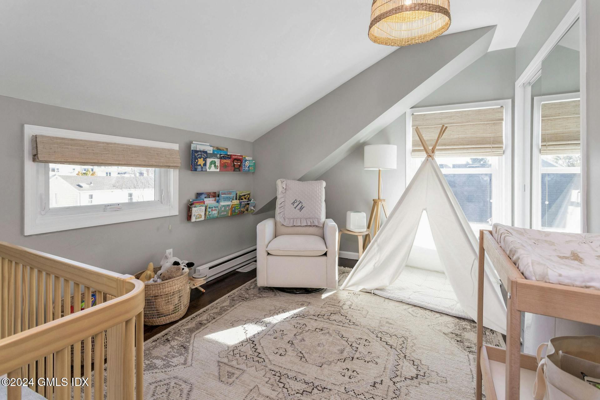 25 Bible Street, Unit 2 Cos Cob, CT 06807 - Photo 16 of 24 a living room with furniture and a window