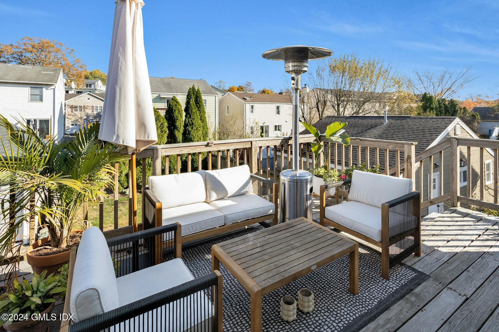 25 Bible Street, Unit 2 Cos Cob, CT 06807 - Photo 19 of 24 a view of a balcony with furniture