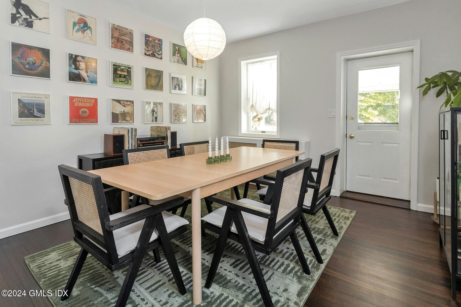 25 Bible Street, Unit 2 Cos Cob, CT 06807 - Photo 5 of 24 a view of a dining room with furniture and wooden floor