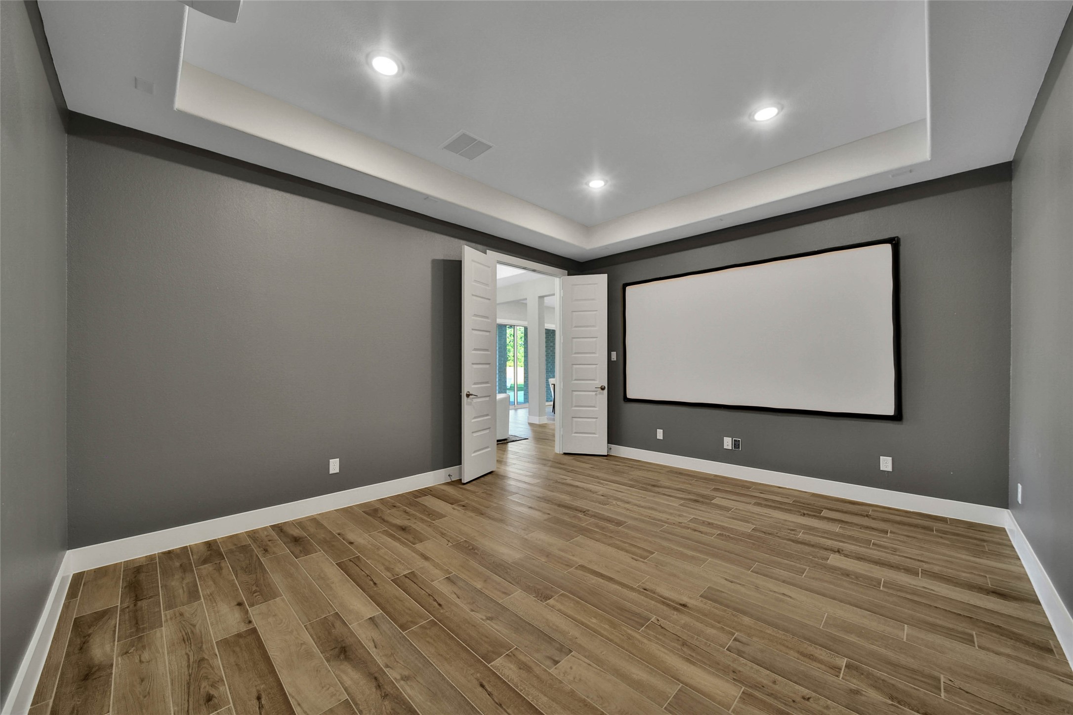 29402 Cir S Rnch Trail Fulshear, TX 77406 - Photo 23 of 50 Fully Equipped with a screen an Epson projector, ths 1st floor Media will have you watching movies from day one!