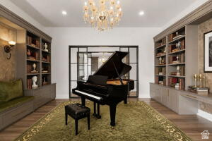 1141 East Lost Ridge Drive Washington, UT 84780 - Photo 54 of 108 White walls with recessed lighting and a central chandelier illuminate this room featuring built-in shelving, a window bench with a green cushion, and wood-finish flooring