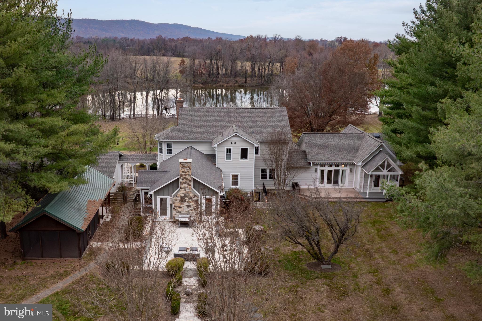 37896 Legard Farm Road Purcellville, VA 20132 - Photo 101 of 117 an aerial view of a house with a garden