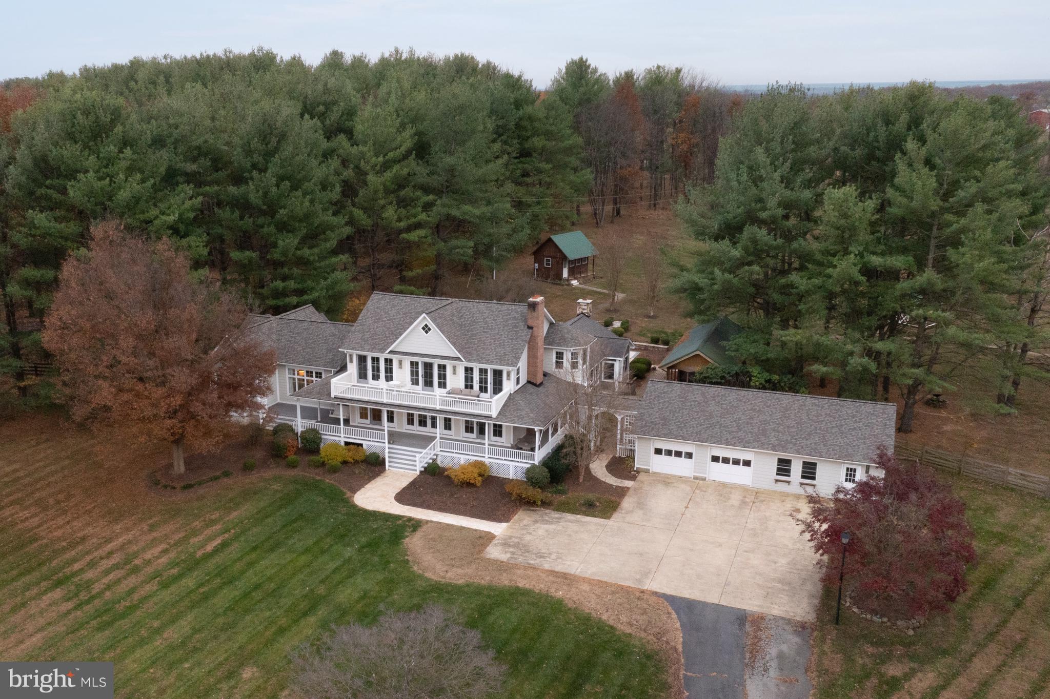 37896 Legard Farm Road Purcellville, VA 20132 - Photo 105 of 117 an aerial view of a house with a big yard