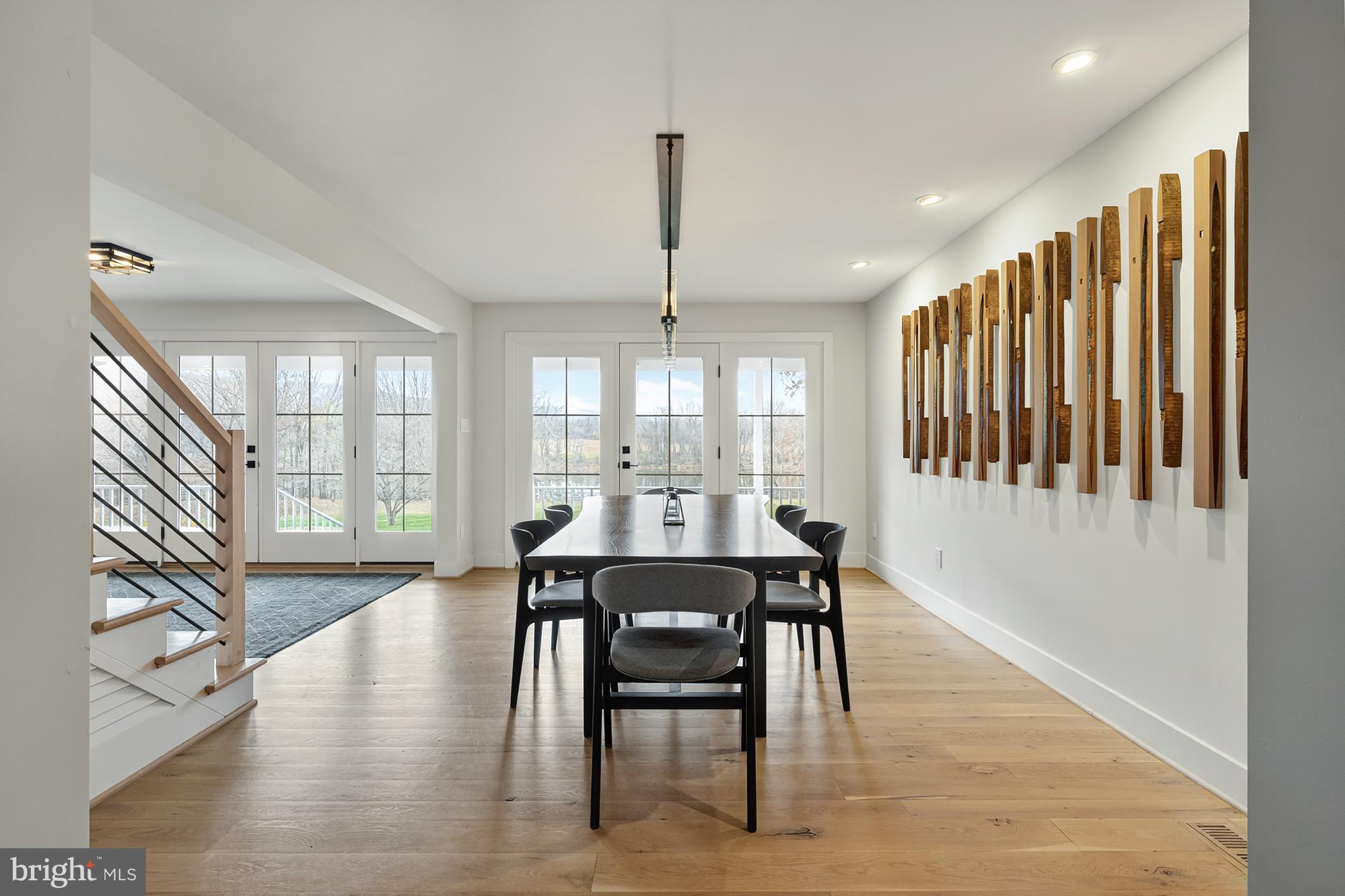 37896 Legard Farm Road Purcellville, VA 20132 - Photo 17 of 117 a view of a a dining room with furniture window and wooden floor