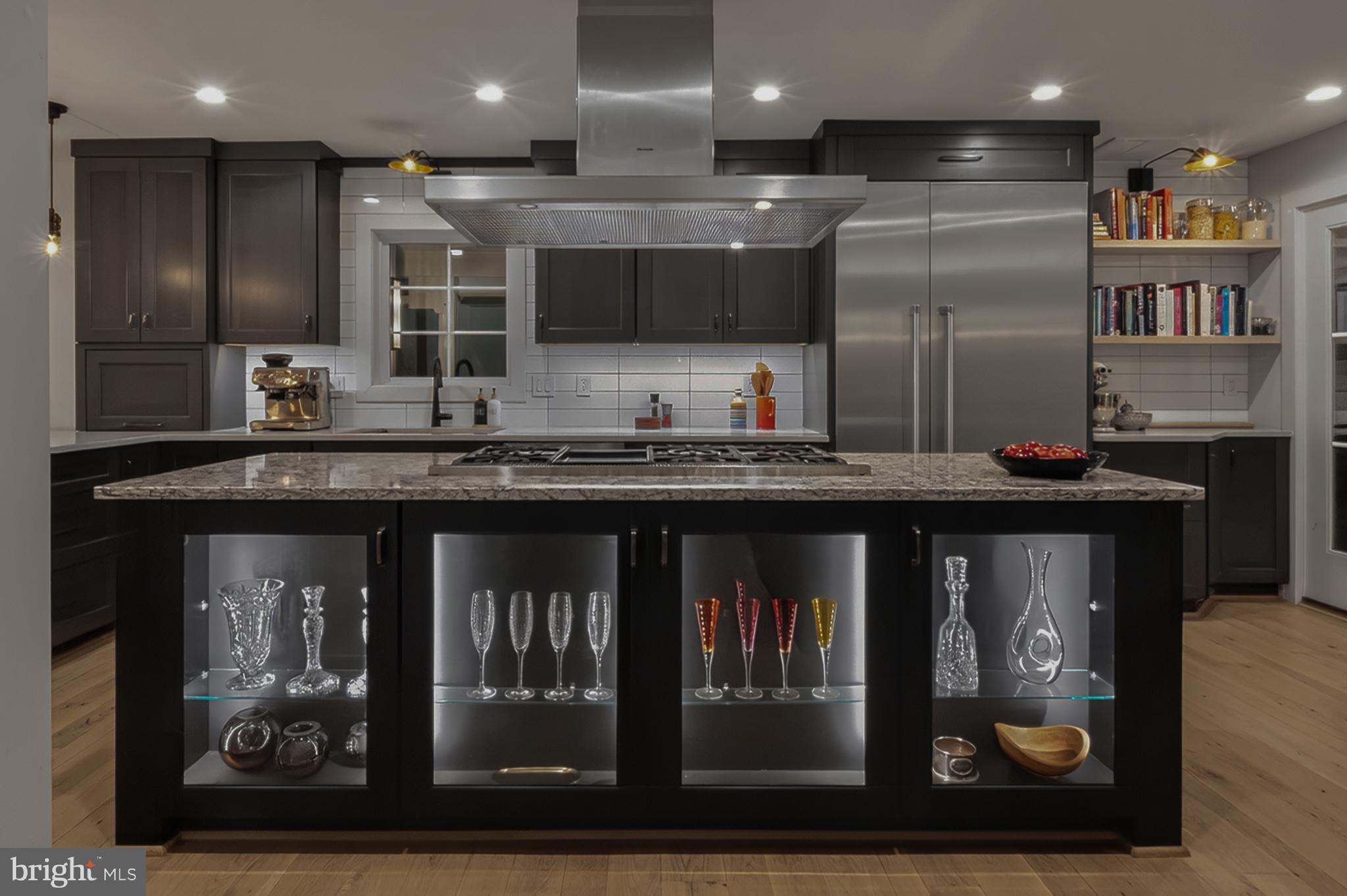 37896 Legard Farm Road Purcellville, VA 20132 - Photo 25 of 117 a kitchen with stainless steel appliances granite countertop a refrigerator and a stove