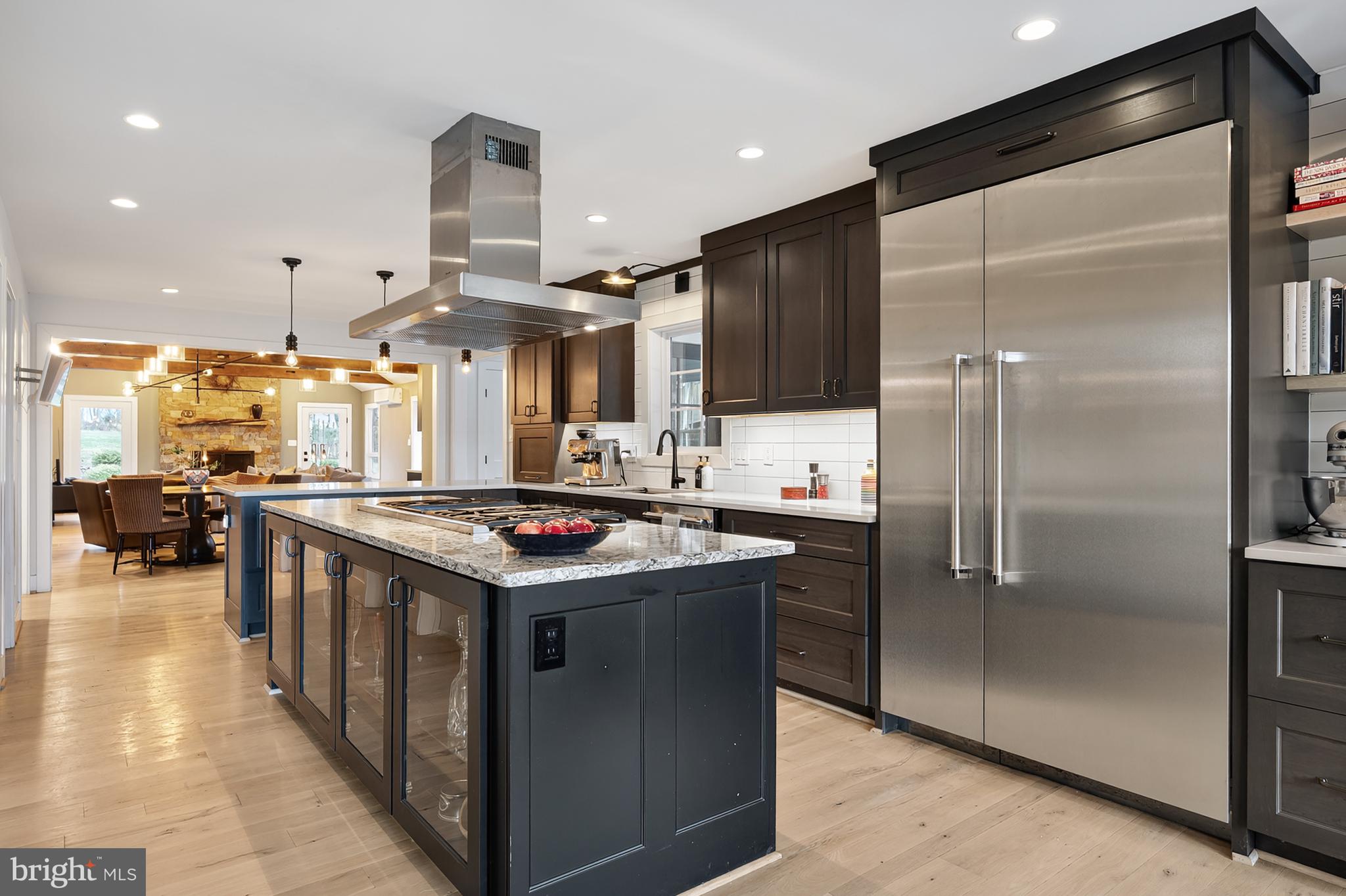 37896 Legard Farm Road Purcellville, VA 20132 - Photo 26 of 117 a kitchen with stainless steel appliances granite countertop a stove and a refrigerator