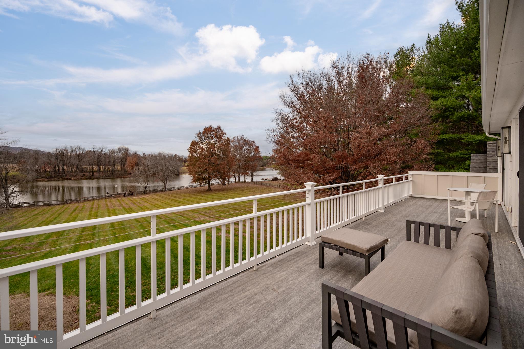 37896 Legard Farm Road Purcellville, VA 20132 - Photo 70 of 117 a view of a balcony with mountain view and wooden floor
