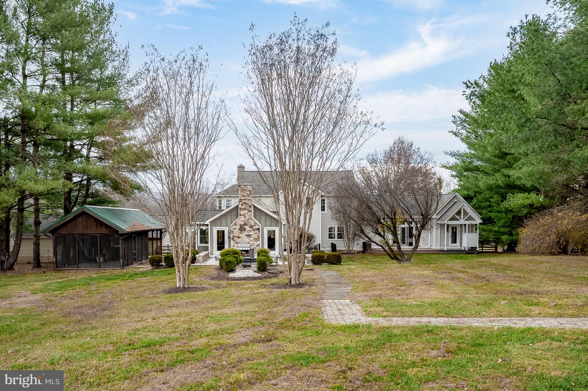 37896 Legard Farm Road Purcellville, VA 20132 - Photo 87 of 117 a view of a yard with a house and a large tree