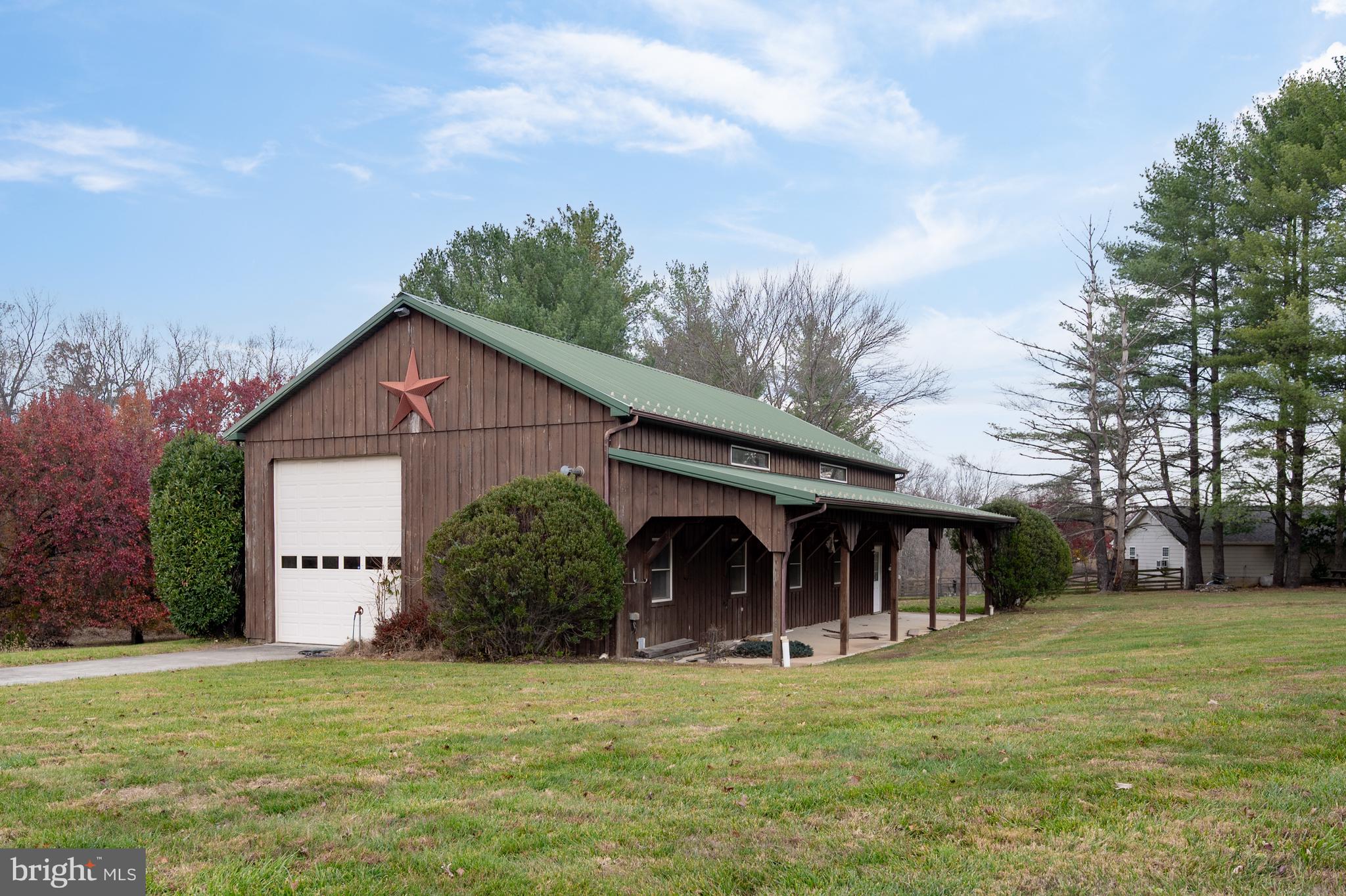 37896 Legard Farm Road Purcellville, VA 20132 - Photo 90 of 117 a view of a house with backyard and garden