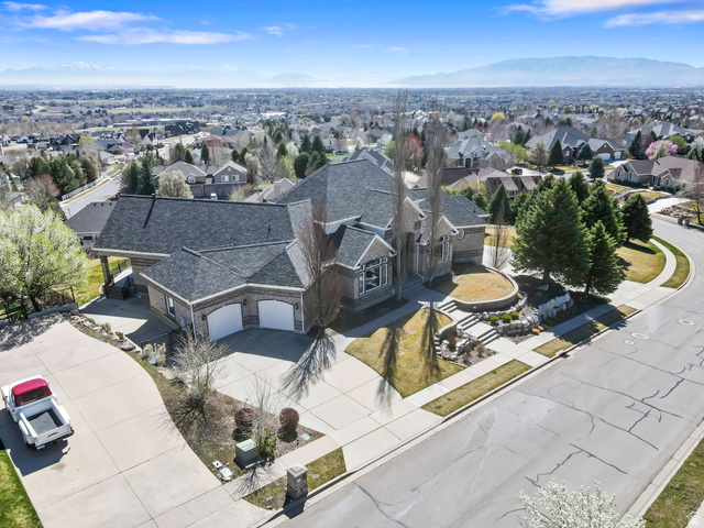 684 North Summit Way Alpine, UT 84004 - Photo 6 of 58 Aerial perspective of suburban area featuring mountains