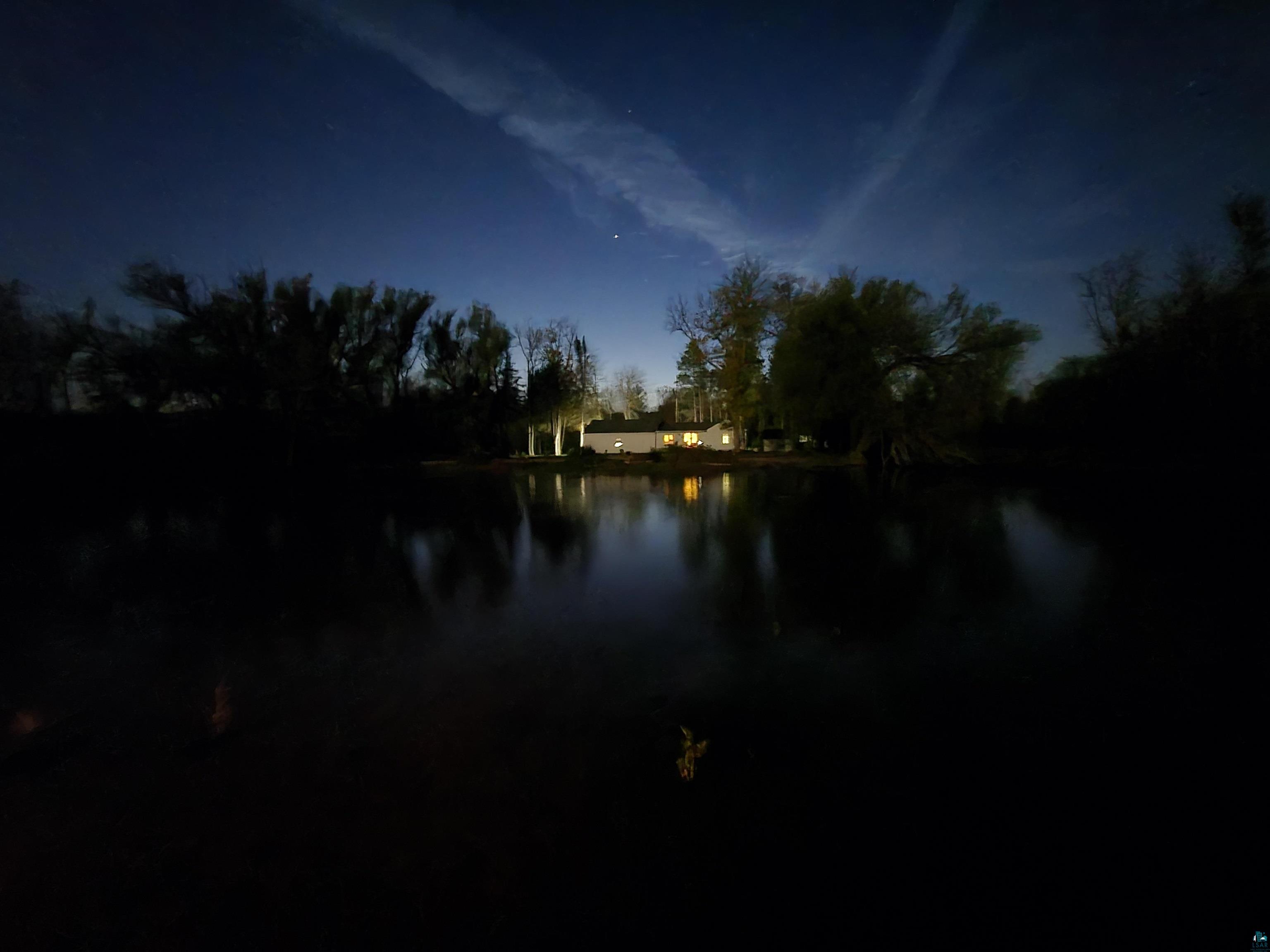 6424 Summit Avenue Washburn, WI 54891 - Photo 32 of 68 Night View Of Home From Lake