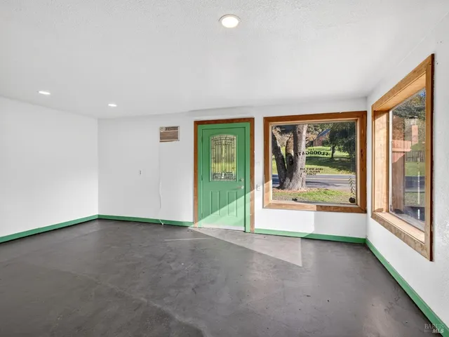 a living room with a couch and a table