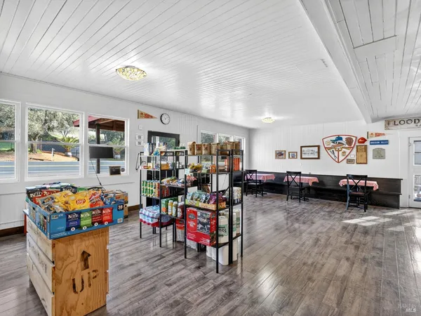 a view of a livingroom with furniture and window