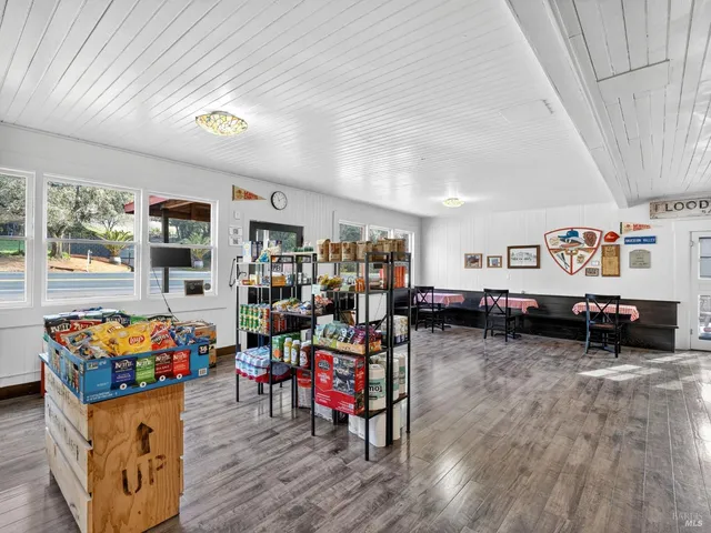 a view of a livingroom with furniture and window