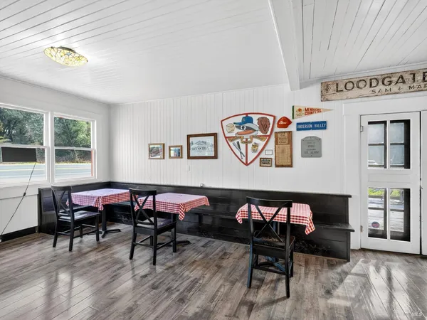 a kitchen with sink stove and cabinets