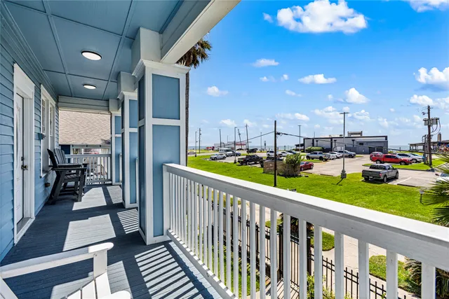 a view of a porch and garden