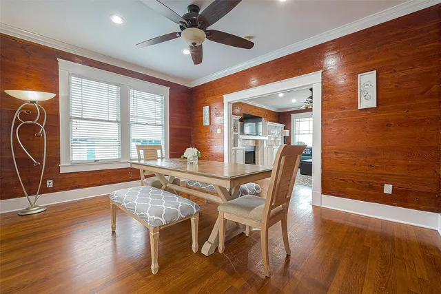 a kitchen with stainless steel appliances granite countertop a sink and a refrigerator