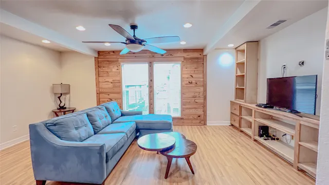 a kitchen with stainless steel appliances granite countertop a stove and a refrigerator