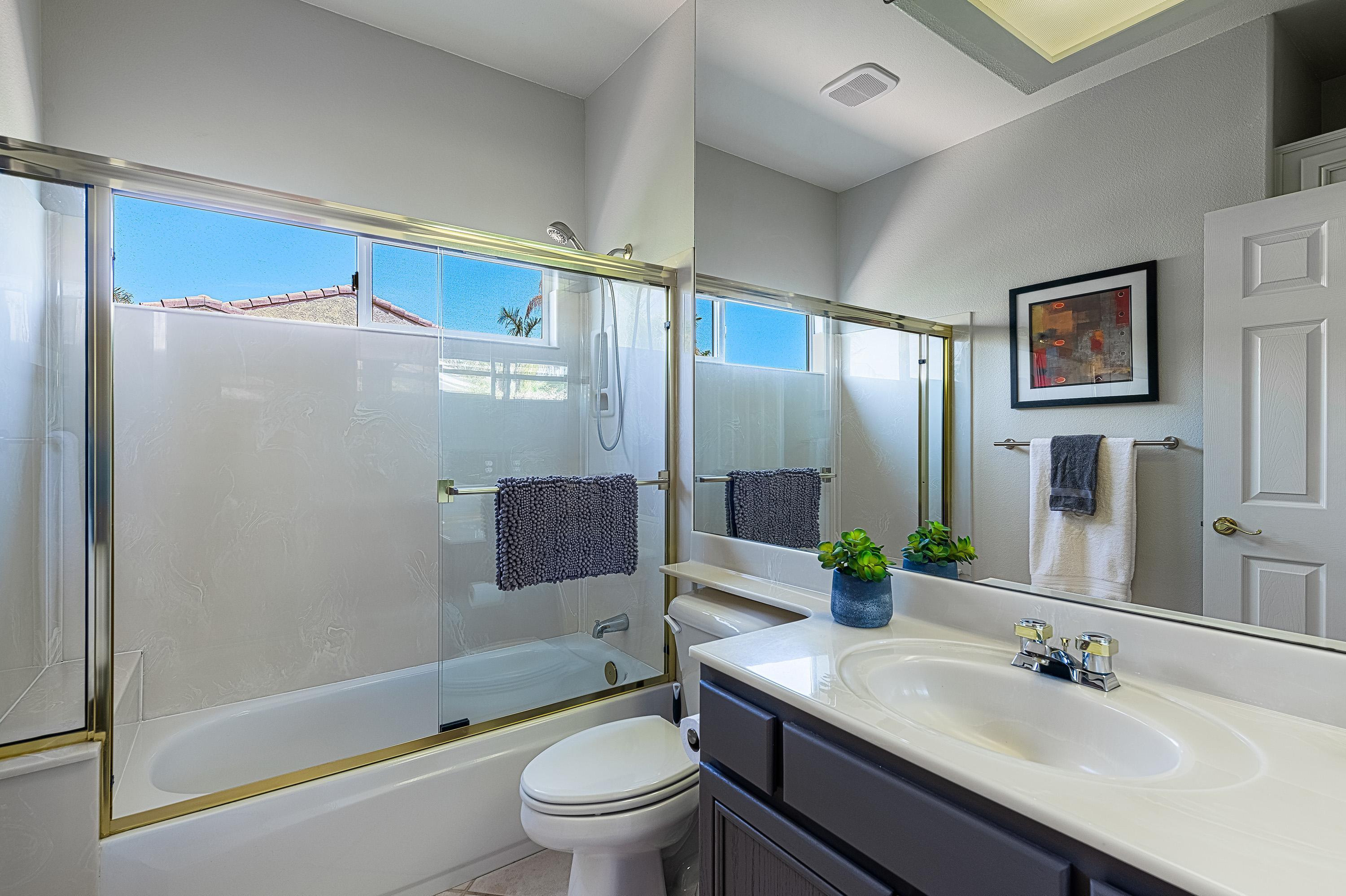 7 Florentina Drive Rancho Mirage, CA 92270 - Photo 20 of 45 a bathroom with a sink toilet and shower