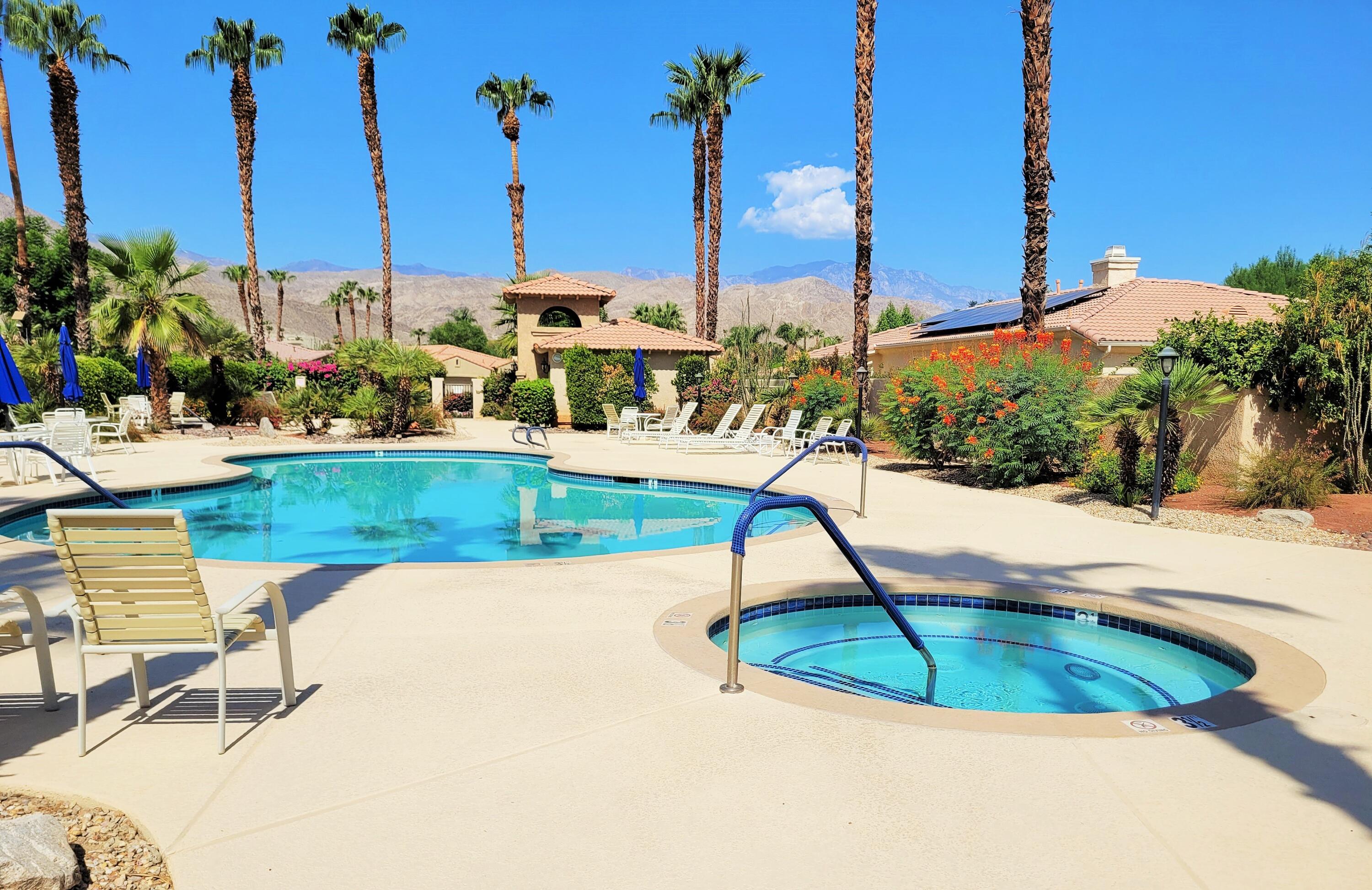 7 Florentina Drive Rancho Mirage, CA 92270 - Photo 24 of 45 a view of a swimming pool with a yard