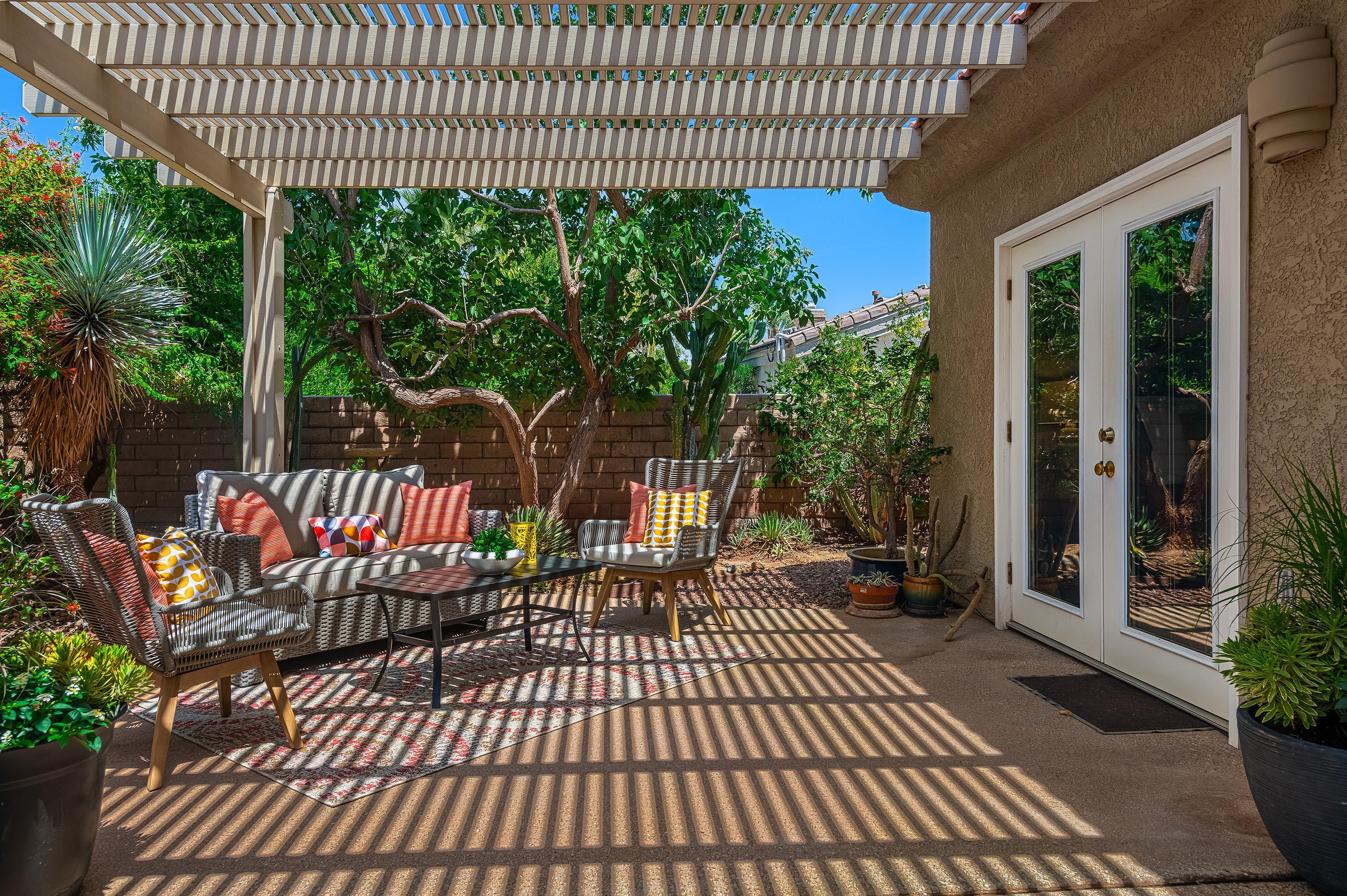 7 Florentina Drive Rancho Mirage, CA 92270 - Photo 32 of 45 a view of a garden with large trees