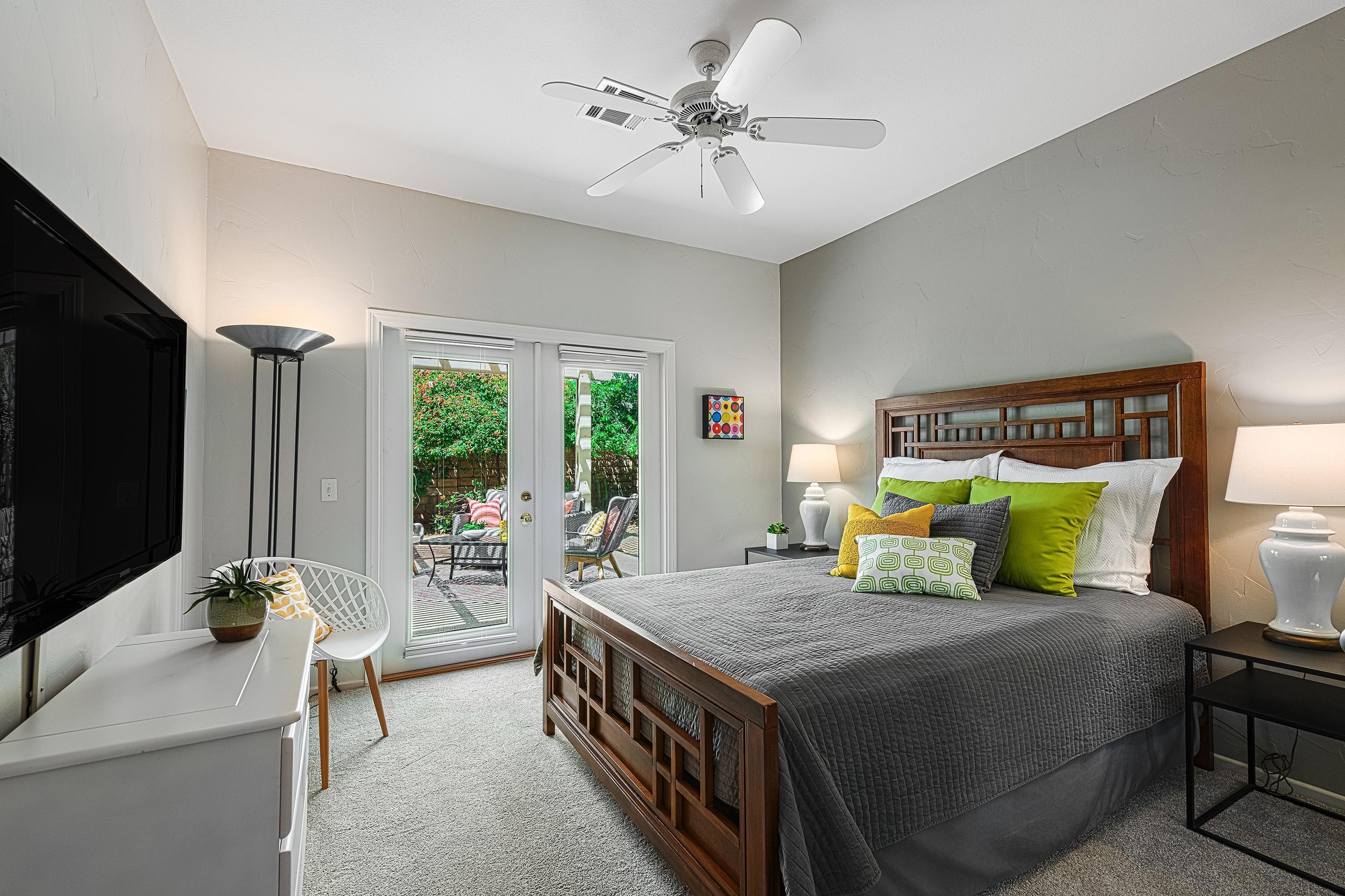 7 Florentina Drive Rancho Mirage, CA 92270 - Photo 36 of 45 a bed room with furniture and a flat screen tv