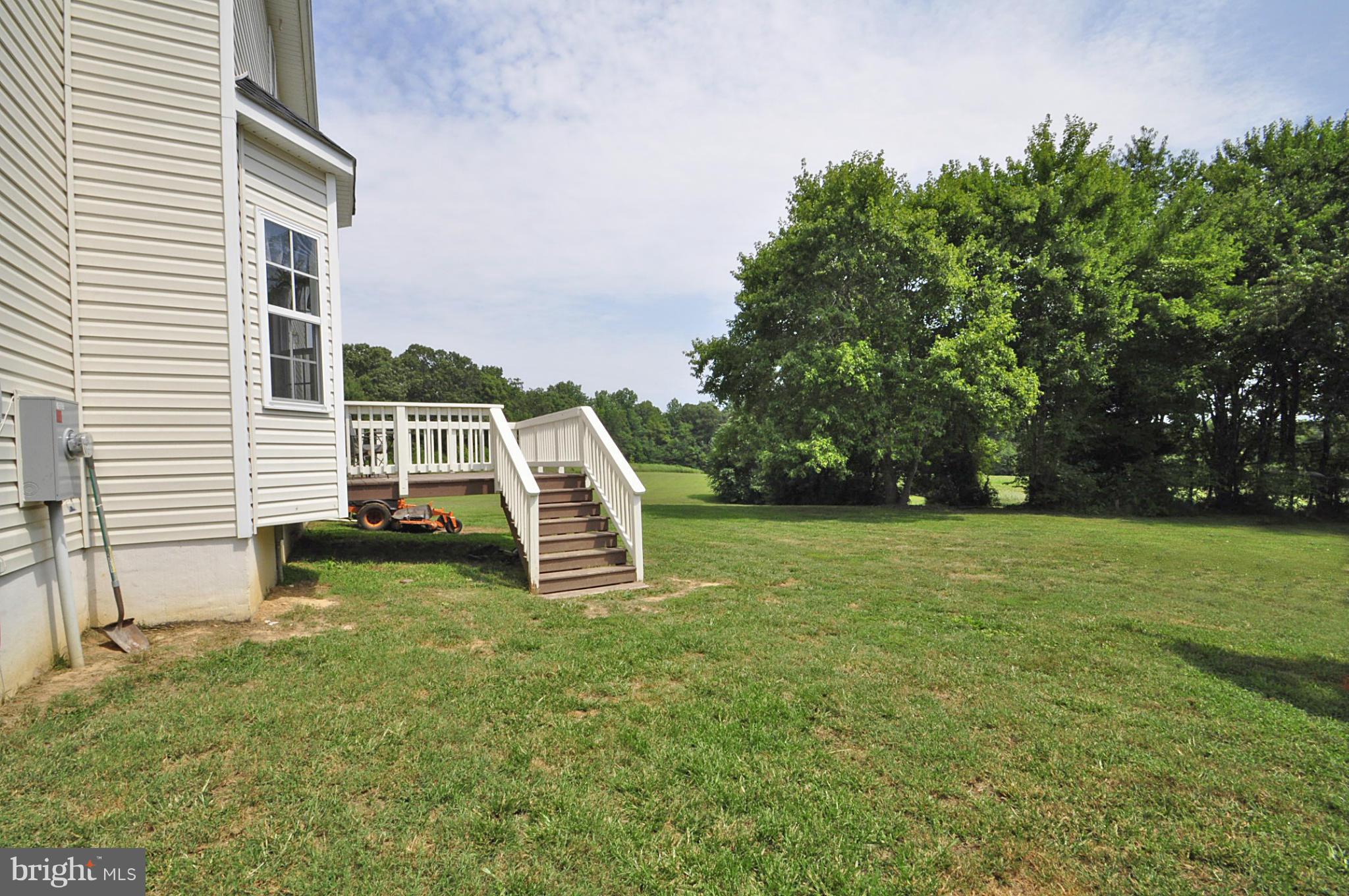 4625 Lewiston Road Bumpass, VA 23024 - Photo 24 of 30 a view of a chair and table in the garden