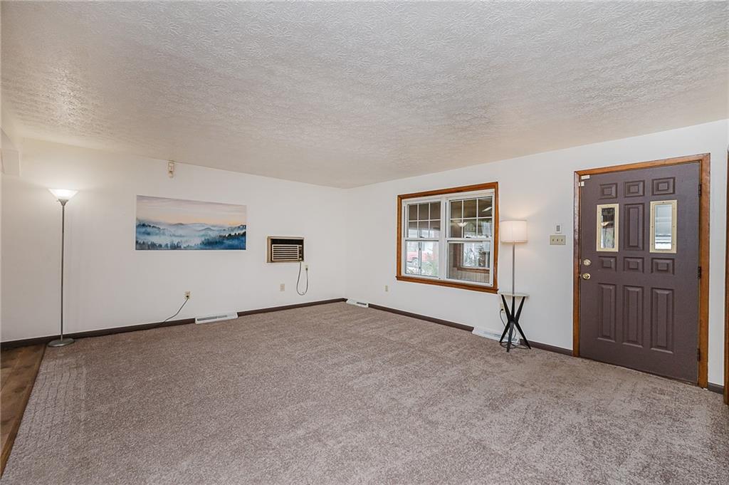 28 Indiana Avenue Avonmore, PA 15618 - Photo 12 of 49 an empty room with windows & cabinet