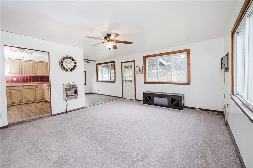 28 Indiana Avenue Avonmore, PA 15618 - Photo 15 of 49 a living room with furniture and a large window