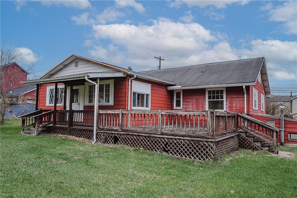 28 Indiana Avenue Avonmore, PA 15618 - Photo 29 of 49 a front view of a house with a garden