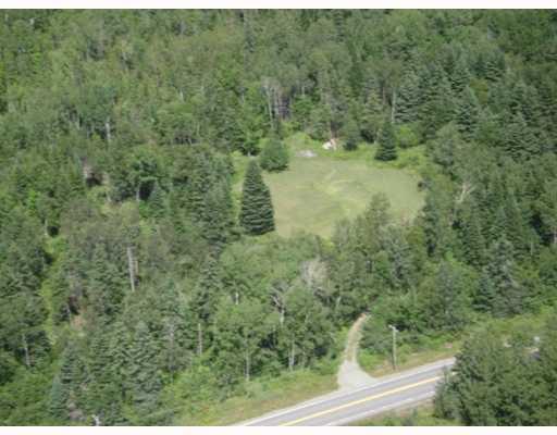 50 Long Pond Road Jackman, ME 04945 - Photo 1 of 8 Aerial View. Mostly wooded/cleared...